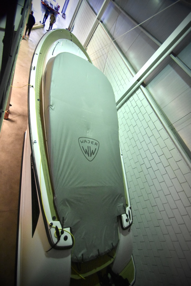 Covered Wajer tender stored indoors at the Tidal Marine facility