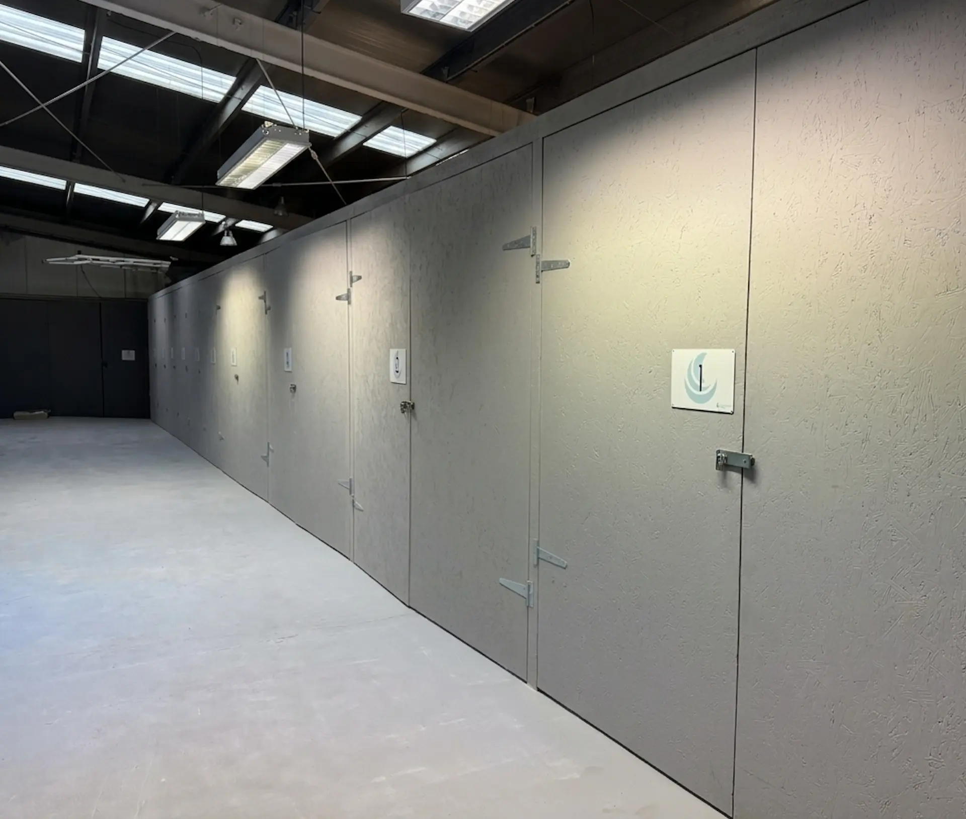 Row of private lockable storage rooms inside the Tidal Marine facility